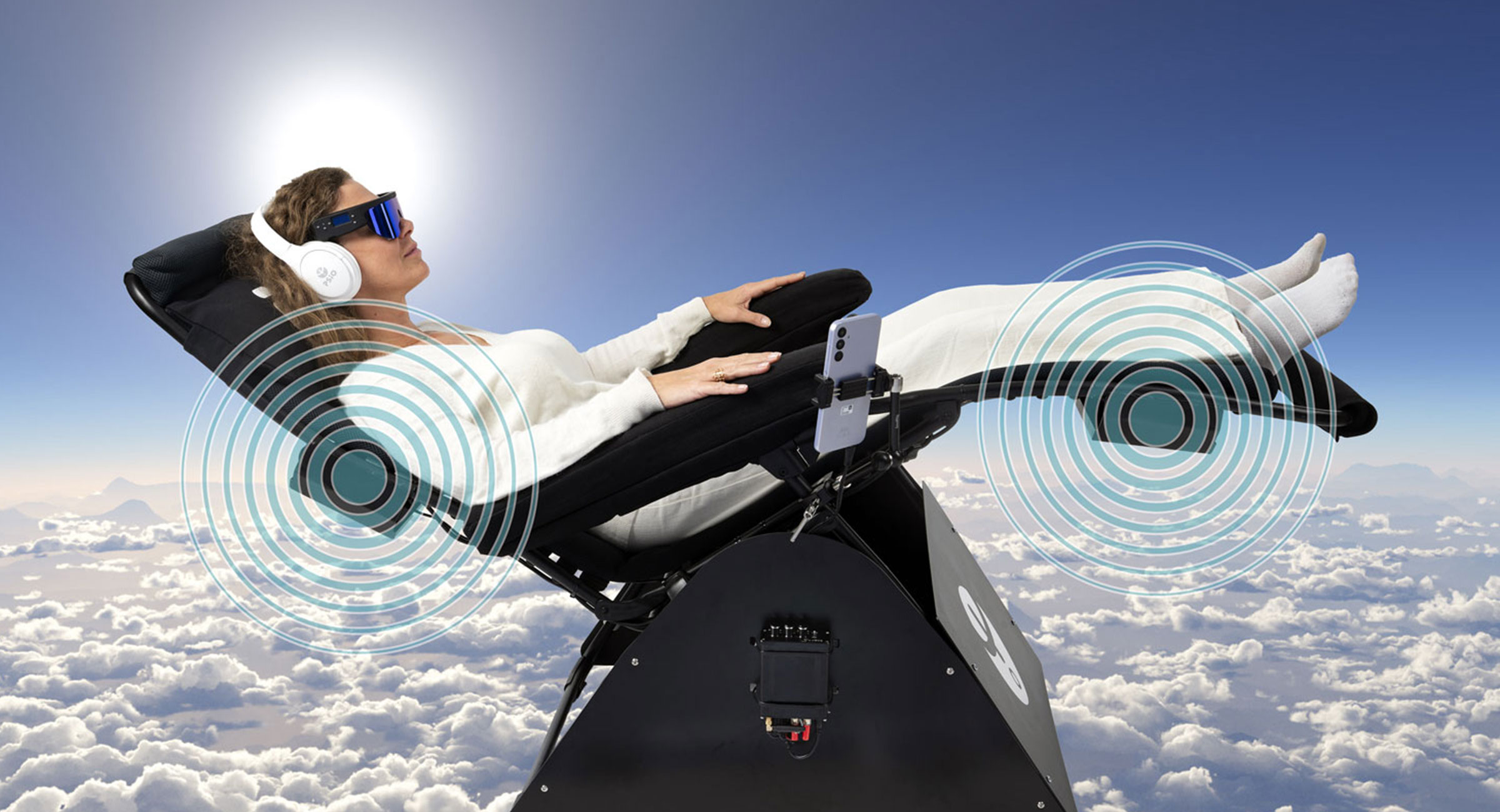 Woman on a vibraoacoustic chair